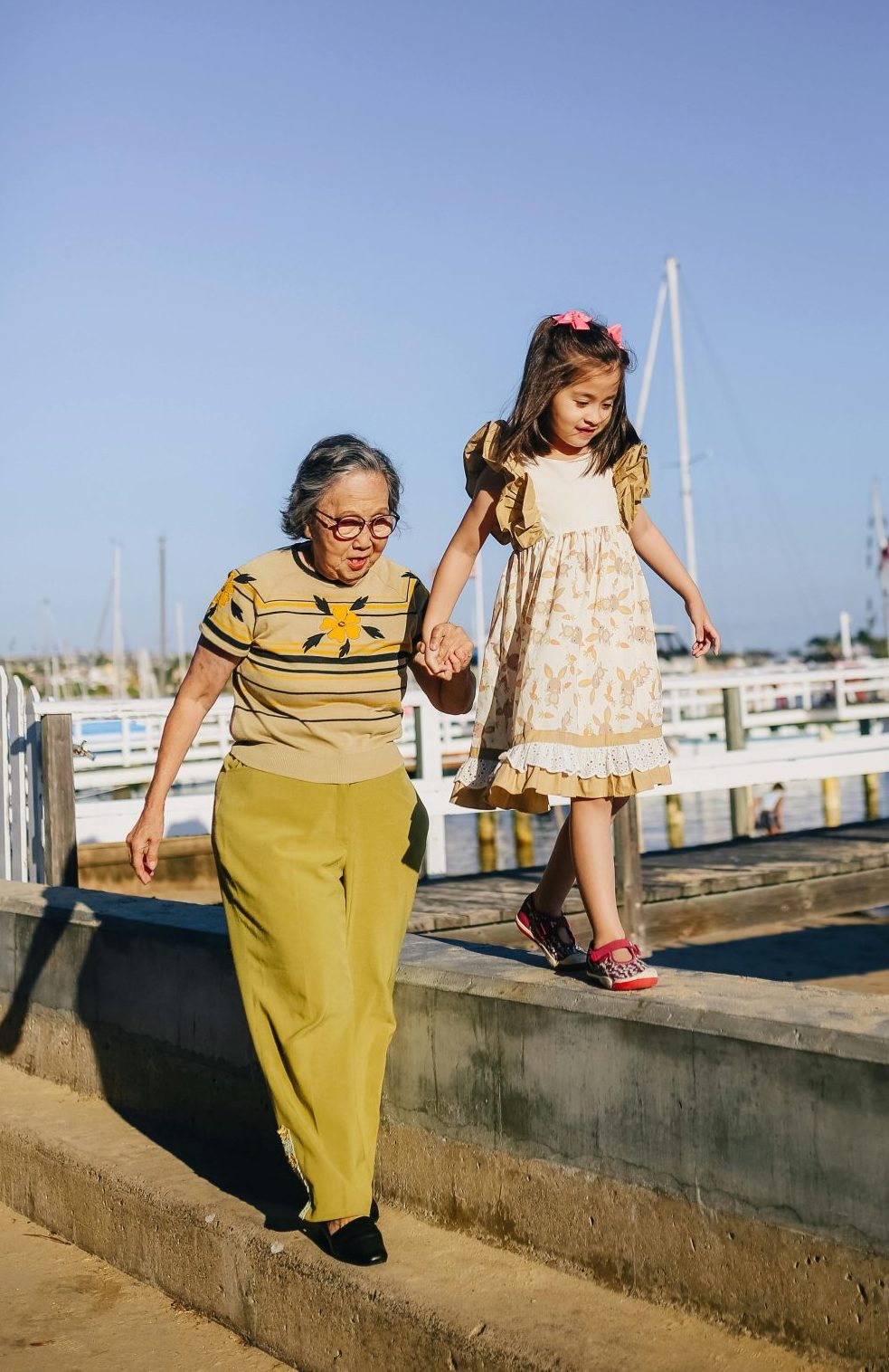 Grandmother and granddaughter female happy worker
