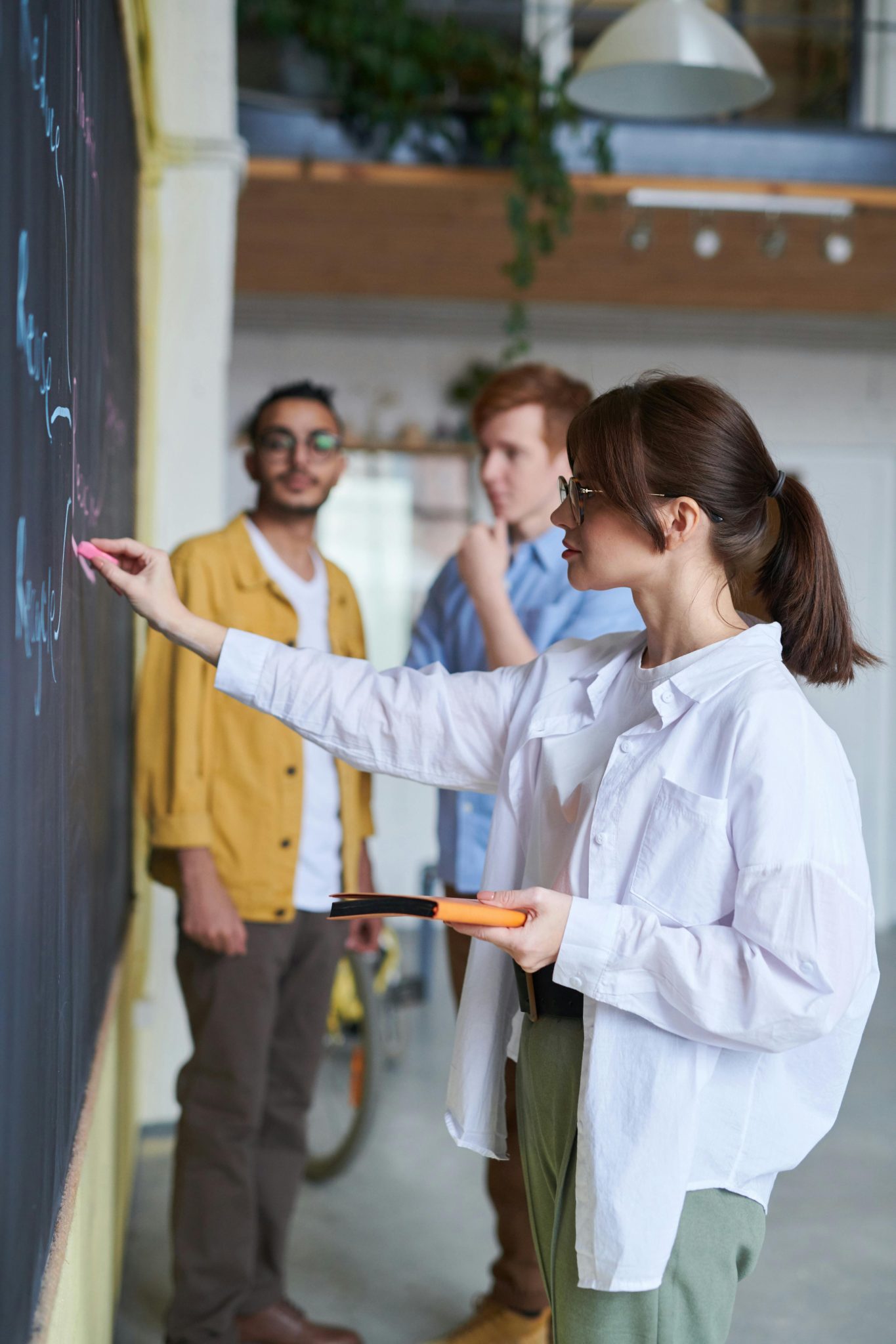 Woman teaching business man